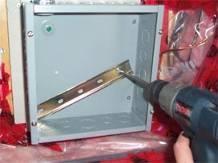1] Attach electrical enclosure to the breaker panel with conduit 2] Mount electrical enclosure onto