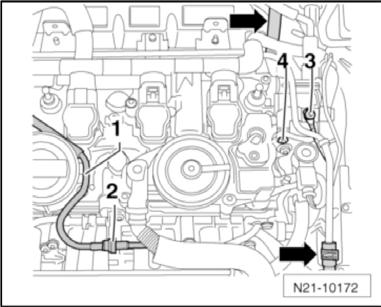 6) Unclip the vacuum line running over the cylinder head to the turbocharger at the separation