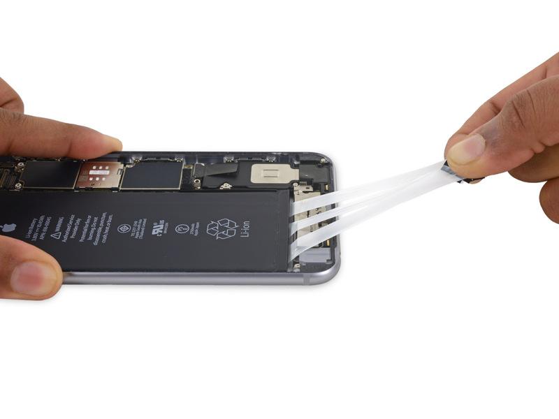 Step 24 Gently pull the battery adhesive tabs away from the battery, toward the bottom of the iphone.