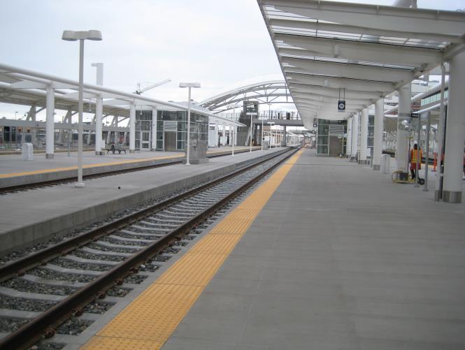 station itself, passengers may walk to the 16 th Street end of the platform and around or they may take the elevators seen in the distance to the lower level (which is the bus