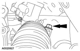 NOTE: With the mounting bolts removed, slide the gear forward to separate the steering coupling from the steering gear shaft.
