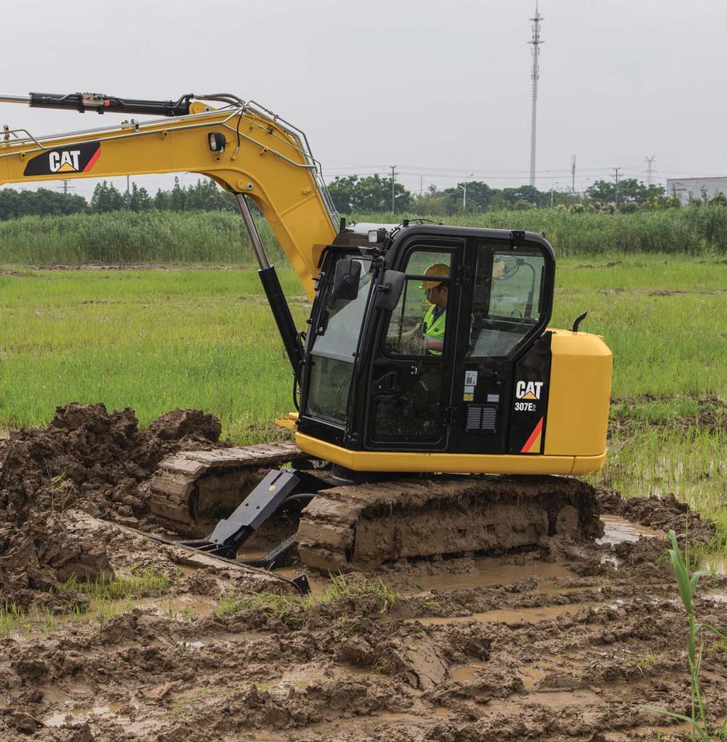 The Cat 307E2 Mini Hydraulic Excavator delivers superior performance and comfort while reducing your fuel consumption and operating costs. The large spacious cab provides a comfortable work area.