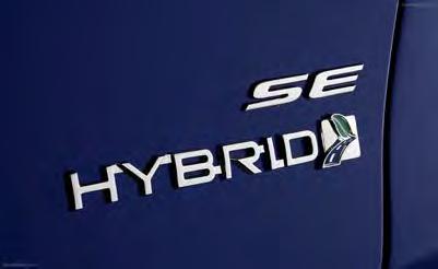 There is a Hybrid nameplate on the trunk lid (located on the right hand side) that also includes the green leaf/blue