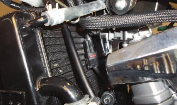 FIG.N 20 Locate and unplug only the stock GREY wire from the right side Ignition Coil (Fig. N). FIG.