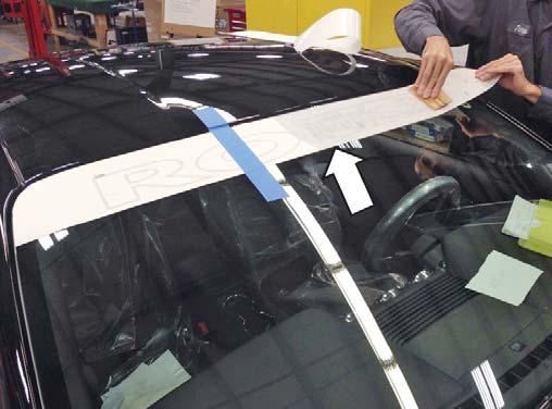 windshield. 2. Place the ROUSH windshield banner onto the windshield and align the top edge of the banner with the top edge of the glass.
