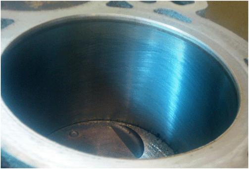 Important: It is critical to evaluate the piston ring wear/cylinder bore cross hatch. Some minor scratches may be noticed on the cylinder walls during piston ring replacement.