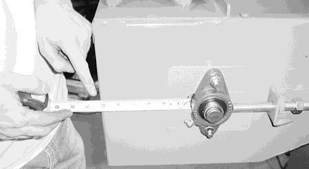 Measure the distance between the bearing and the front edge of the casing (Figure 11) to verify that the headshaft is not cocked.