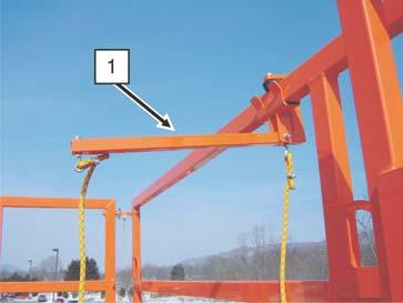SECTION 4 - MACHINE OPERATION 2. While standing on the platform, place the Rail Lowering Tool on the Rail. (reference the illustration following) a.
