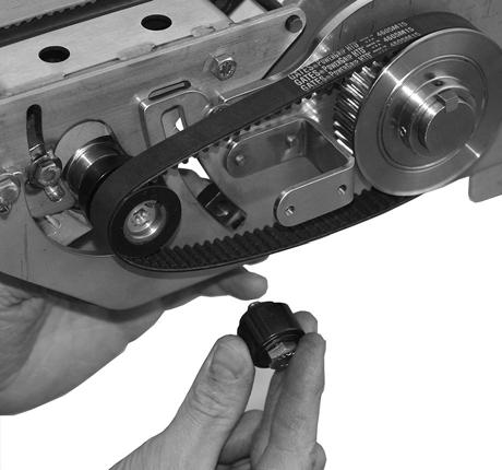 NOTE You may need to slide driven pulley (Figure 6, item ) off of shaft to install timing belt (Figure 6, item ). Figure 7 6.
