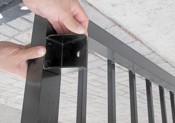 Vertical position of gate bracket: The hole in the gate bracket should be level with the top of the