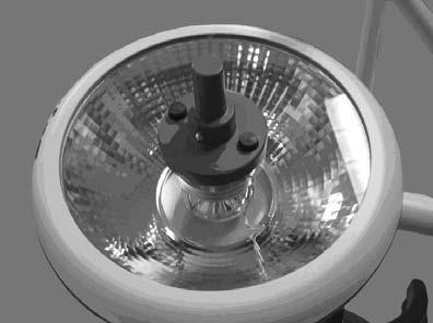 Service Information Changing the Halogen Light WARNING High Temperature Allow the light to cool before attempting maintenance. The light is hot while in operation.