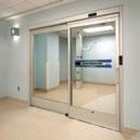 telescopic clear door opening on 8' package 53 11/16" activation equal leaf design surface mount package smoke rated package to ul 1784 antimicrobial coating 1