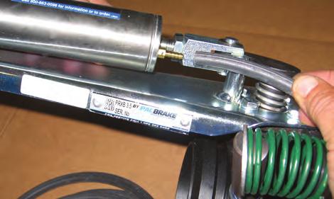 Connect the nylon airline from the air tank to the port on the solenoid marked IN. Connect the remaining piece of nylon airline to the solenoid port marked CYL.