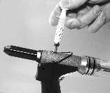 ) Keep the tool upright during all operations. Disconnect the tool from the air supply. ) Unscrew the oil fill screw from the body using the allen wrench included. (Fig. 5.