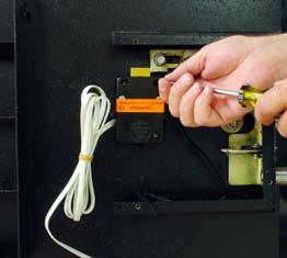 cable in the channel cast into the underside of the lock case as you position the lock on the