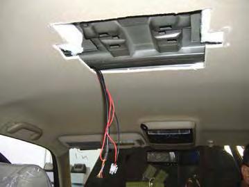 With harness still connected feed wire puller above headliner from A-pillar