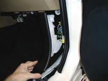 Remove plastic bolt from passenger cowl side
