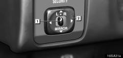 COMFORT ADJUSTMENT Power rear view mirror control 1 Master switch 16sa31a 2 Control switch To adjust the power rear view mirror, first place the master switch at L (left) or R (right), and move the