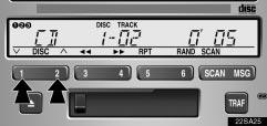 AUDIO (c) Selecting a desired disc (d) Searching for a desired track or disc 22sa25 22sa26 Searching for a desired disc: Push the or button to select the disc number.