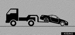 IN CASE OF AN EMERGENCY (a) Towing with a wheel lift type truck From front From rear 40sa42 40sa43 Place the ignition switch in the ACC position. Use a towing dolly under the rear wheels.