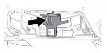 After removal, place the cover inside the rear cargo area of the vehicle to prevent loss.