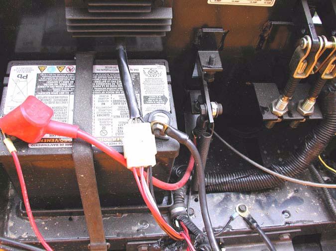 If a customer has complained of this situation, the following change should be made to the wiring harness. 1.1. Turn the engine off and remove the key from the key switch.