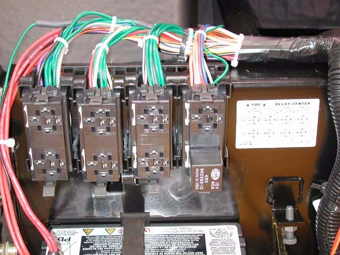 The fuse block has been moved from the vertical surface of the firewall. See Figure 3.1. Fuse block Relay center Figure 2.8 2.9. Lower the bed. Close and secure the hood. 2.10.