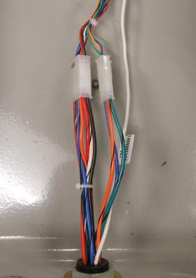 Strip 1/4" of insulation from the white ground wire of the wire harness. 13. Use the 5-position lever splice to connect the ground wires from the pigtail to the QCA harness. See Figure 35.