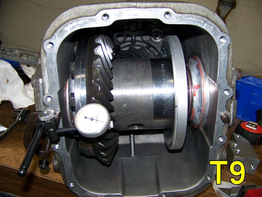 Now insert your completed LSD assembly back into place into the transaxle housing, and secure it there by sliding in the left and right side bearing mounts.