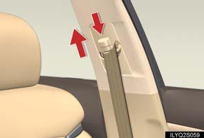 Seat Belts Adjusting shoulder belt height (front seats only) To raise: