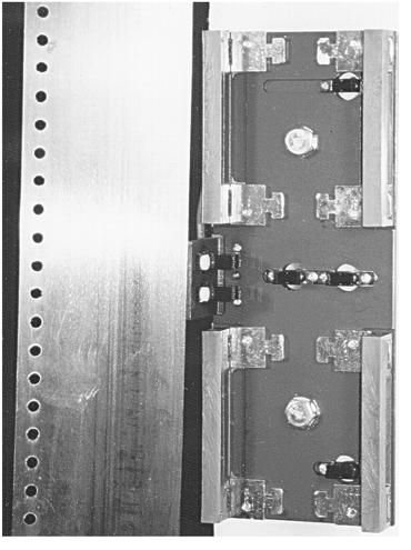 2 Punched steel tape Leveling sensors Dual through-scan sensors Door zone sensor Reset tape sensor