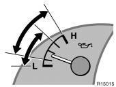 The gauge indicates the engine coolant temperature when the ignition switch is on. The engine operating temperature will vary with changes in weather and engine load.