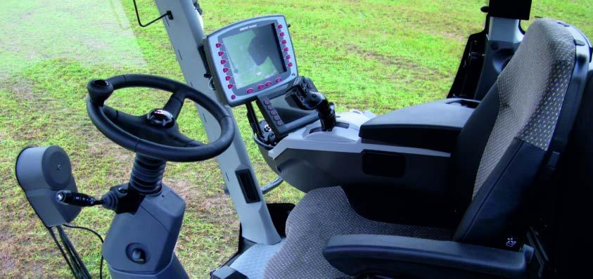 Operator comfort is further enhanced by the ergonomic positioning of all vehicle and sprayer controls, the three axis adjustable steering column
