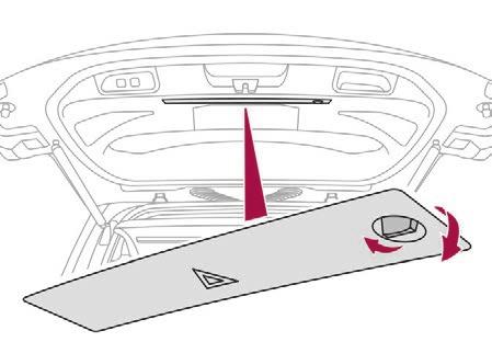08 240 In the event of a breakdown Warning triangle As a safety precaution, before leaving your vehicle to set up and install the triangle, switch on the hazard warning lamps and put on your high