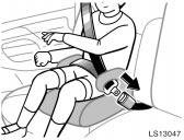 LS13047 1. Sit the child on a booster seat.