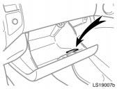 The air conditioning filter information label is placed inside of the glove box as shown and