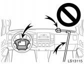 62 LS13115 Do not put anything or any part of your body on or in front of the dashboard or steering wheel pad that houses the front airbag system.