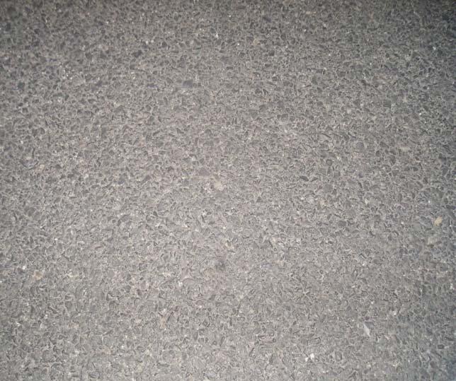 15 in) of conventional hot mix asphalt (HMA) base layer with AC-25, 7 cm (2.75 in) of intermediate layer with AC-20 and 6 cm (2.4 in) of SMA-16 surface mix.