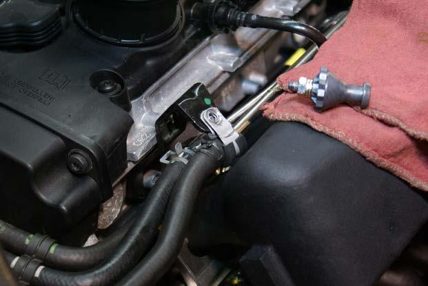 39) Trim notch in engine cover to provide clearance for oil dipstick and install engine cover.