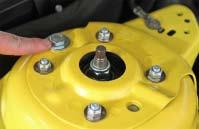 If you are setting your car up for this we recommend using the race orientation. 19. Reattach the spindle to the strut and torque the bolts to the factory setting of 148 lb-ft.