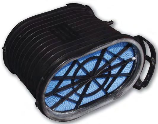 A filter minder, device used to measure filter restriction, is located on the back of the air filter housing.