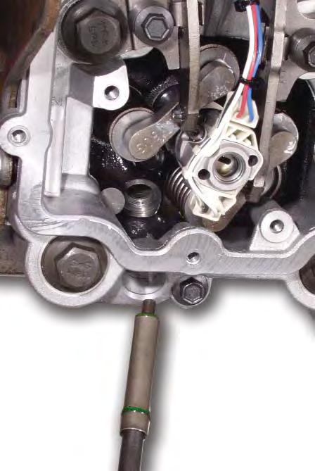 EGR Valve: Removal TOOL #303-760 To remove the EGR valve, remove the two mounting screws from