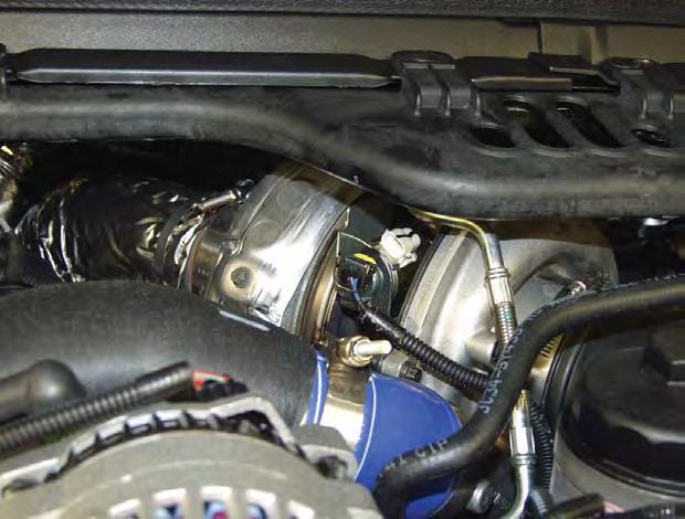 Install a 1/4 ID hose to the fuel pump module and place the other end of the hose into a diesel fuel safe container. Turn the ignition to the on position. The fuel pump will run for approx. 20 sec.