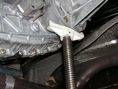o Loosen and remove the fastener holding transmission mount to the cross-member.