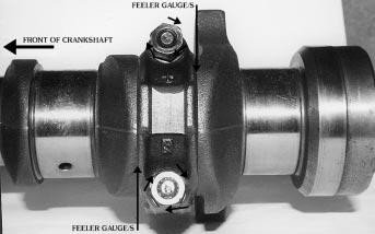 Feeler gauges should be positioned as shown to prevent bearing damage when the connecting rod bolts are tightened. and the actual surfaces of the bearing inserts can be damaged.
