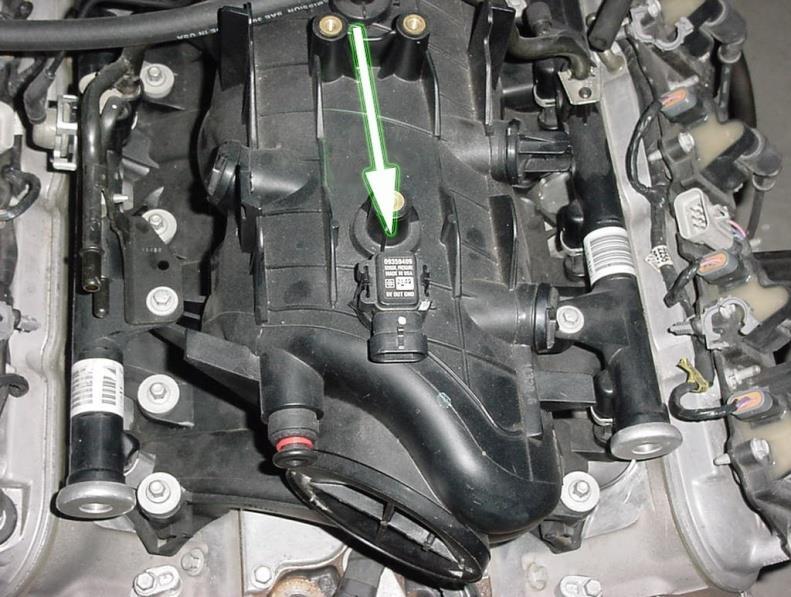 The MAP sensor can be found under the engine cover, on top of the intake manifold, at the rear of the engine, as seen in Figure 11. DRVR. & PASS COILS-.