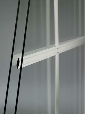 Extruded aluminum bars are adhered to the exterior of Forgent Series windows and doors.