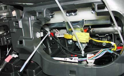 4-14 (5) Route the long LED wire into the passenger side instrument panel opening and