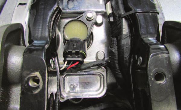 J 12 Locate the REAR Fuel Injector and unplug the stock wiring harness from it (Fig. J).