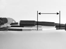 3.9 Place a mark on PILC cable conductor 12 1/2 (320 mm) from connector center. Slide splice body over connector and align leading edge of semi-con extension to mark.